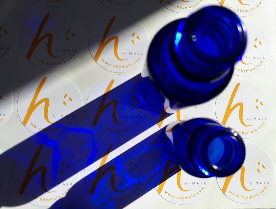 h by maia skincare jars on labels